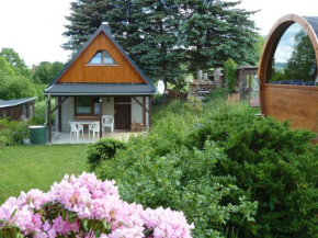 Ferienhaus mit Kamin , Terrasse und Aussensauna